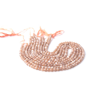 Close‑up of genuine Chocolate Moonstone faceted rondelle beads showing sparkling facets and natural earthy tones.