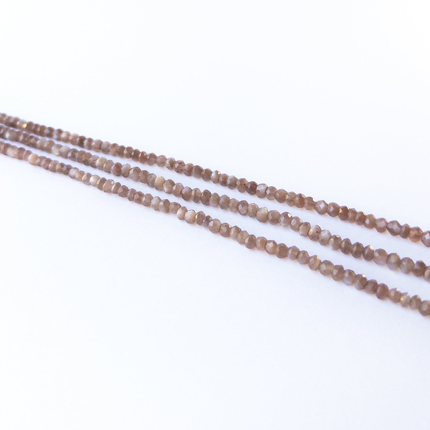 Faceted Chocolate Moonstone rondelle beads with earthy mocha hues, perfect gemstone beads for DIY jewellery making.