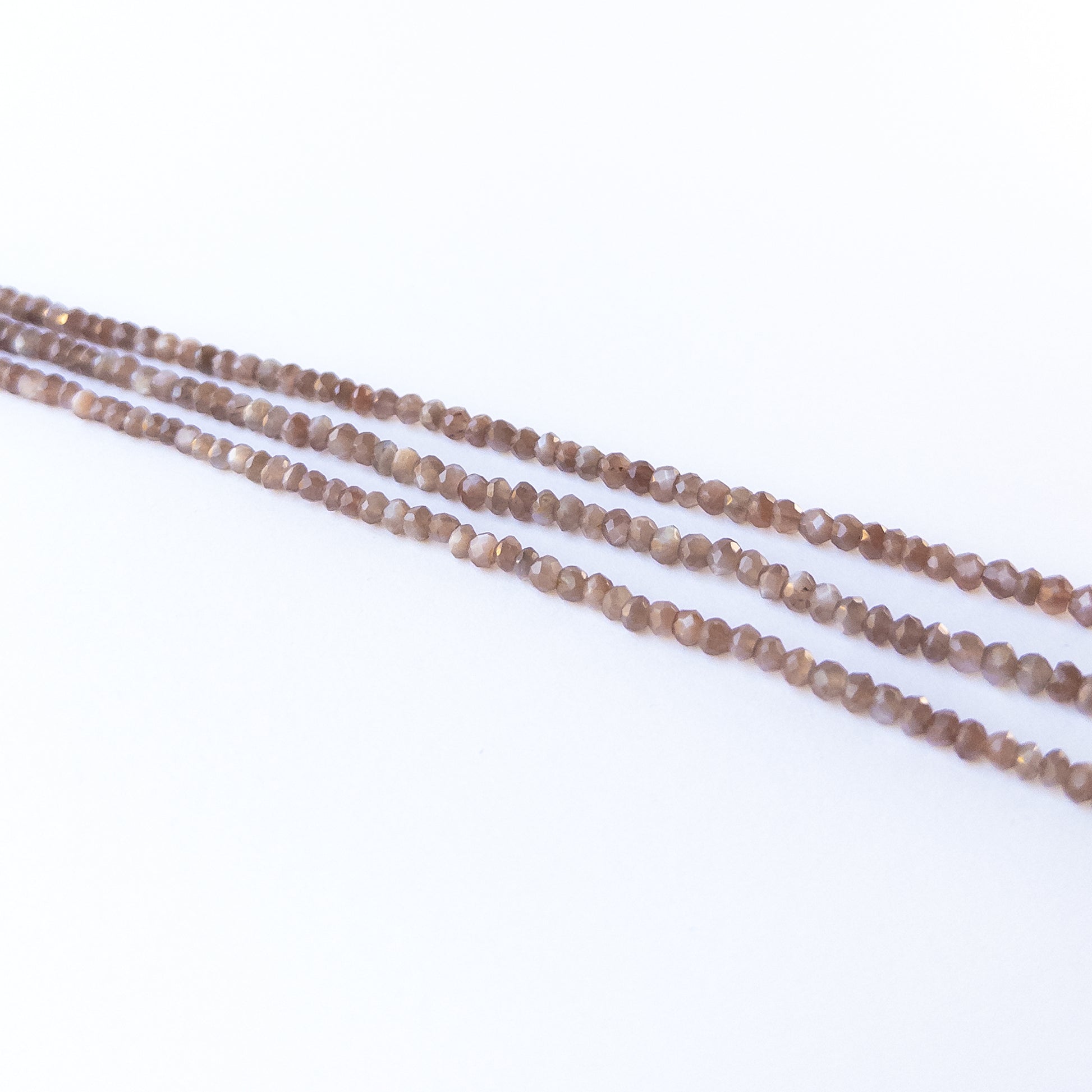 Faceted Chocolate Moonstone rondelle beads with earthy mocha hues, perfect gemstone beads for DIY jewellery making.