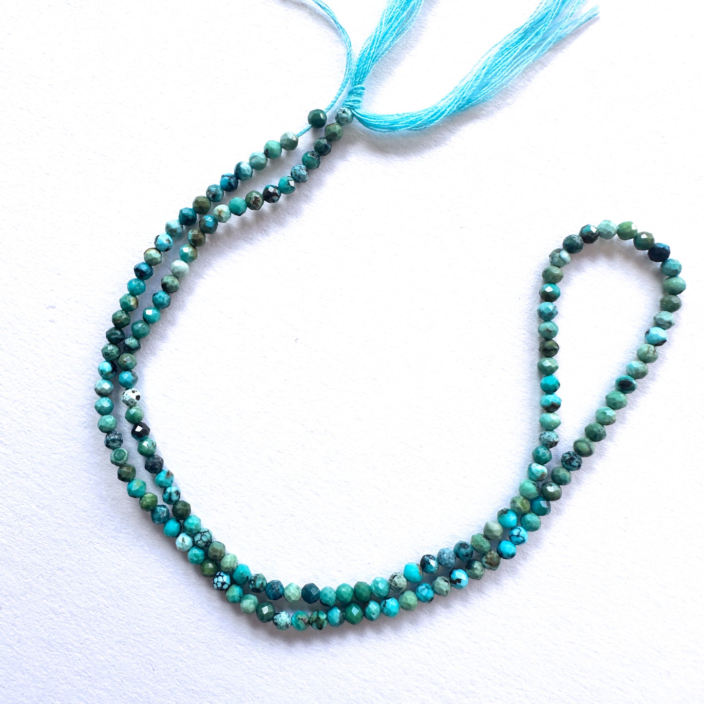 Chrysocolla faceted rondelle beads with vibrant turquoise and green tones for handmade jewellery components.