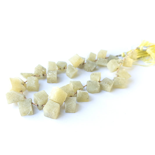 Genuine Chrysoberyl Cat's Eye stone beads in drilled rough form with glowing eye effect ideal for DIY jewellery making.