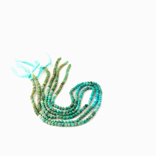 Genuine Chrysocolla faceted rondelle beads, 3mm, arranged on a 32cm strand for handmade jewellery components.