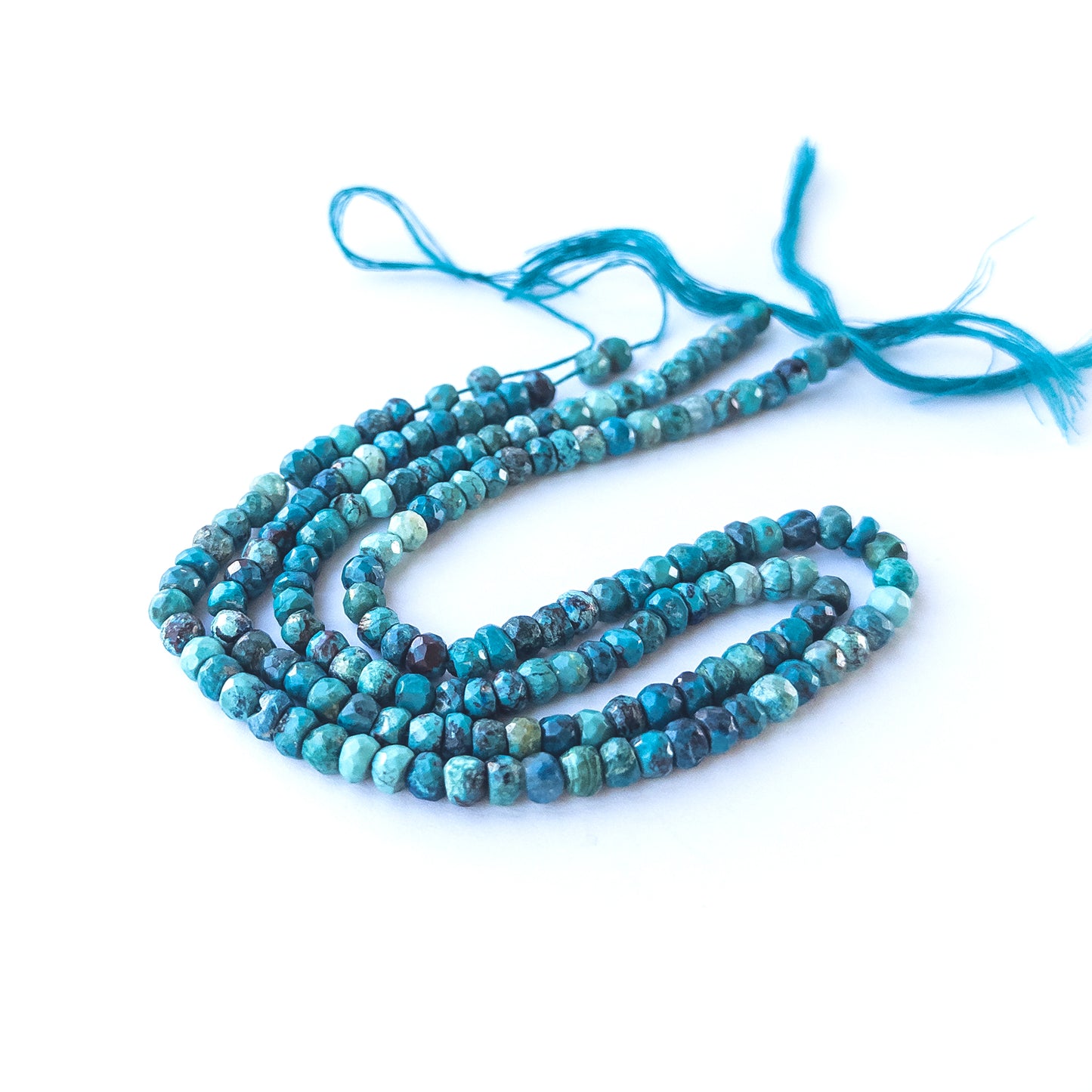 High‑quality Chrysocolla faceted rondelle beads with bright teal tones ideal for handmade jewellery components.