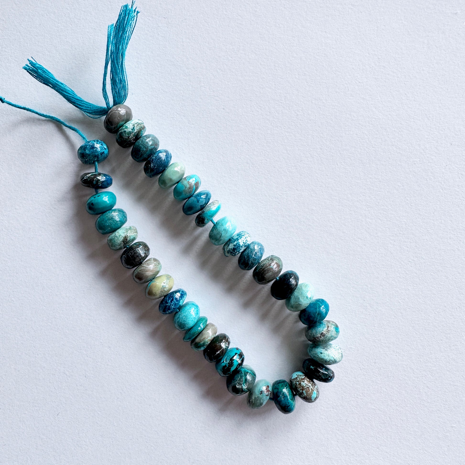 Handmade jewellery components Australia showcasing Chrysocolla beads with rich ocean-inspired hues.