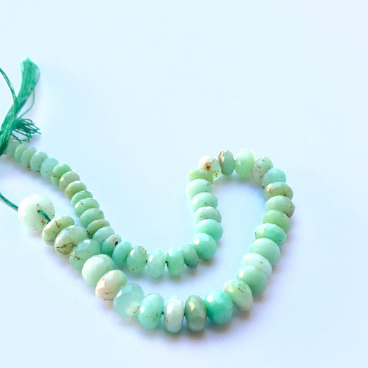 Close‑up of 5–8mm Chrysoprase stone beads showing sparkling facets and vivid colour ideal for natural gemstone beads for DIY jewellery.