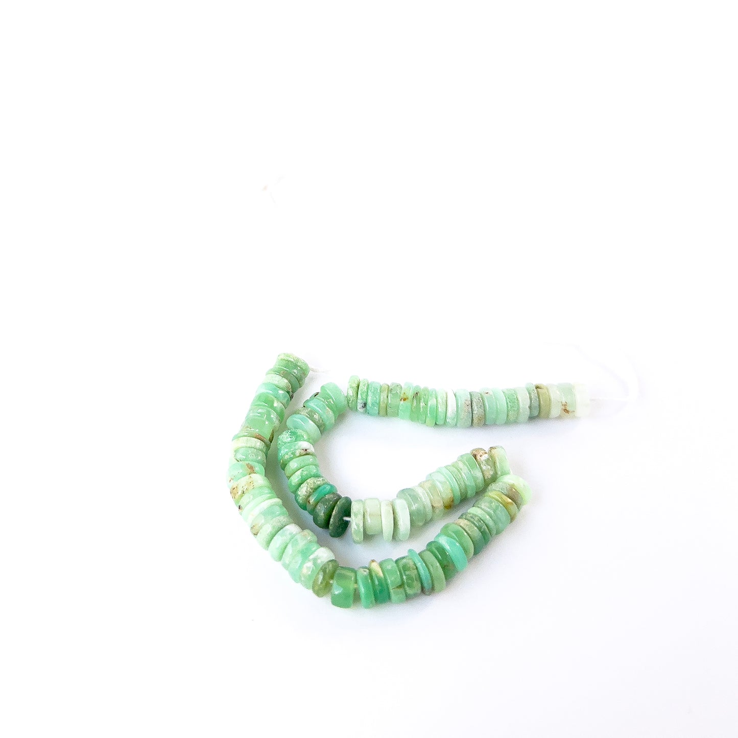 High‑quality Chrysoprase smooth wheel beads aligned on a 20cm strand for artisan jewellery designs.
