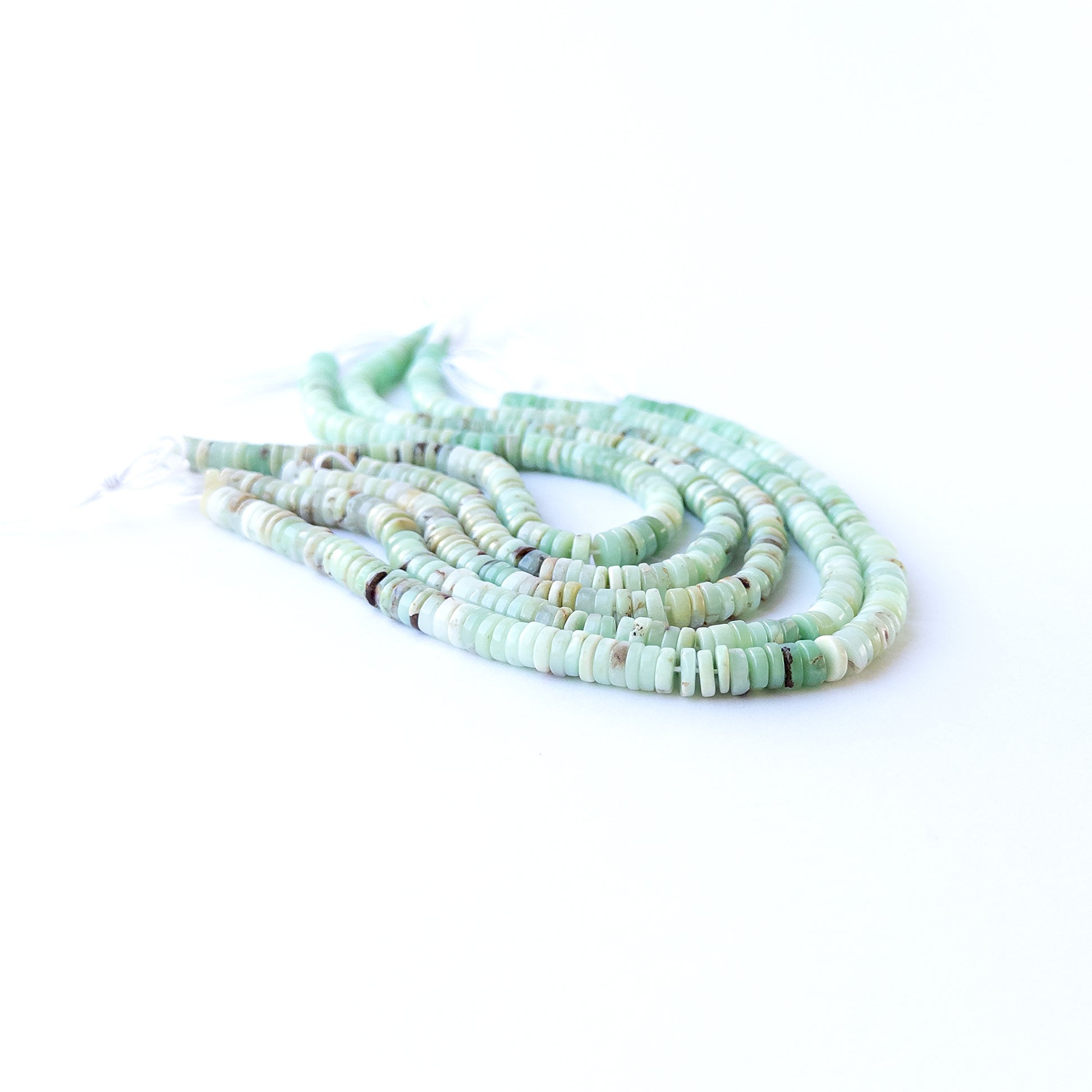 Genuine Chrysoprase gemstone beads with smooth wheel cut, perfect for artisan jewellery designs.