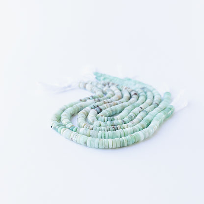 Authentic Chrysoprase wheel stone beads with calming hues, ideal for DIY jewellery and gemstone beadwork.