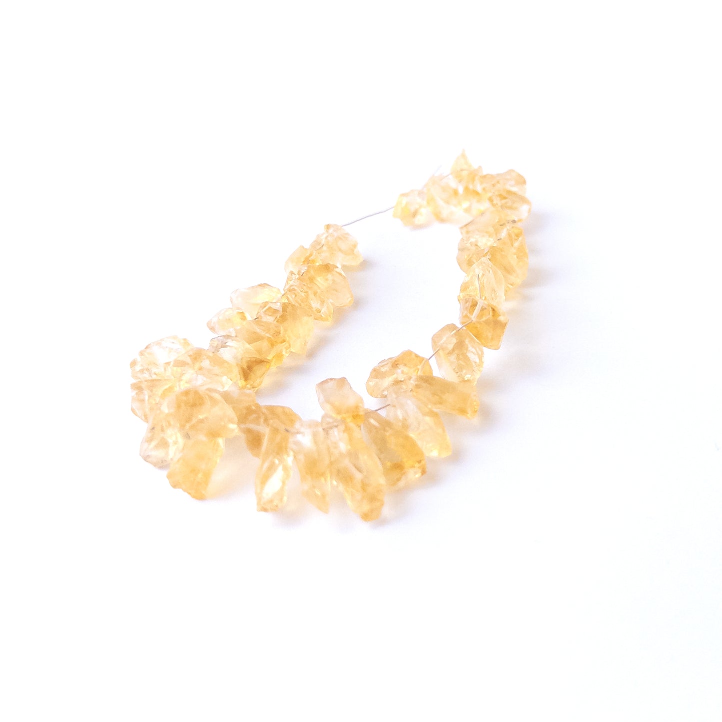 Genuine Citrine gemstone beads showcasing raw organic form, bright colour and handmade jewellery quality.