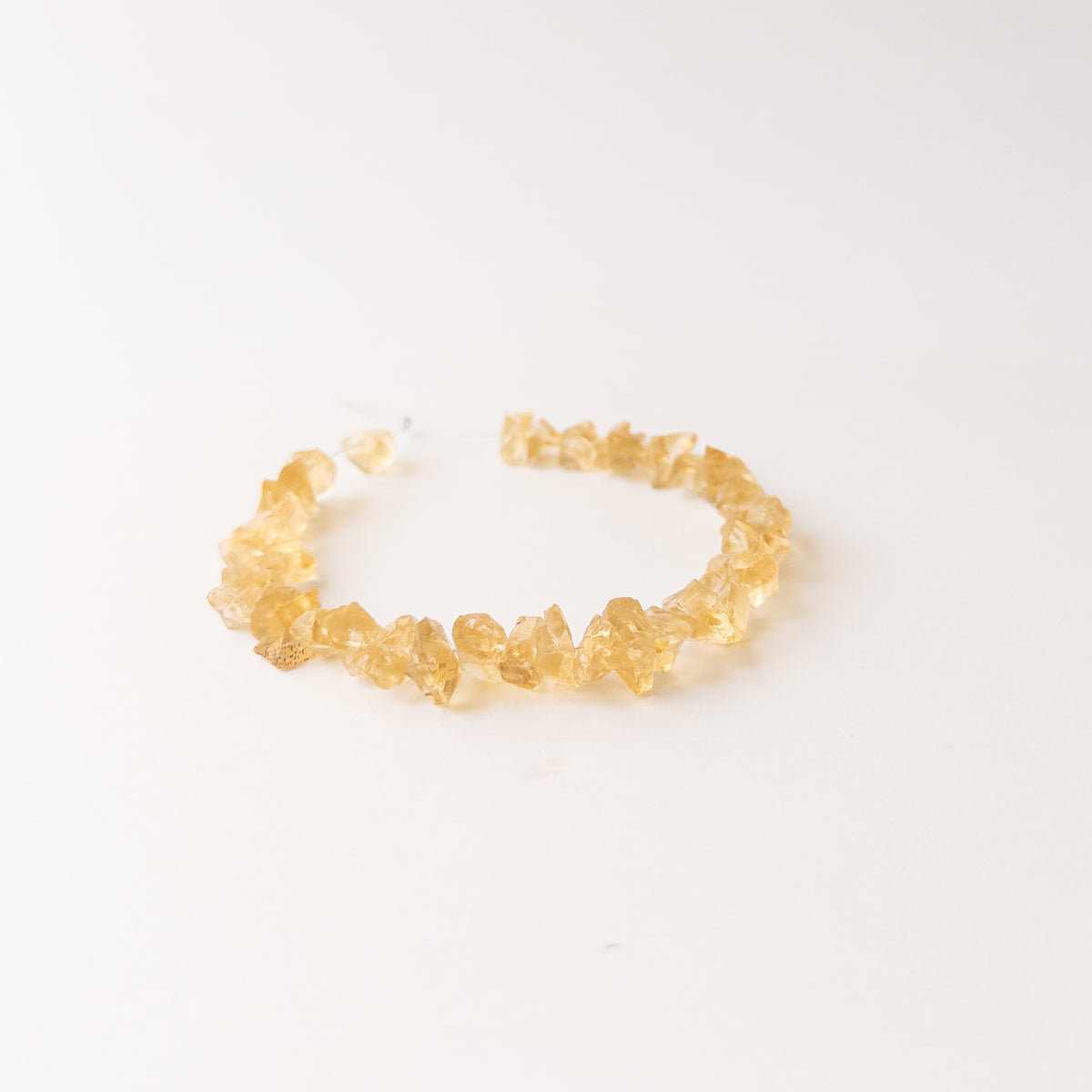 Raw Citrine drilled rough beads in assorted 6.5–7.5mm sizes for artisan jewellery designs.