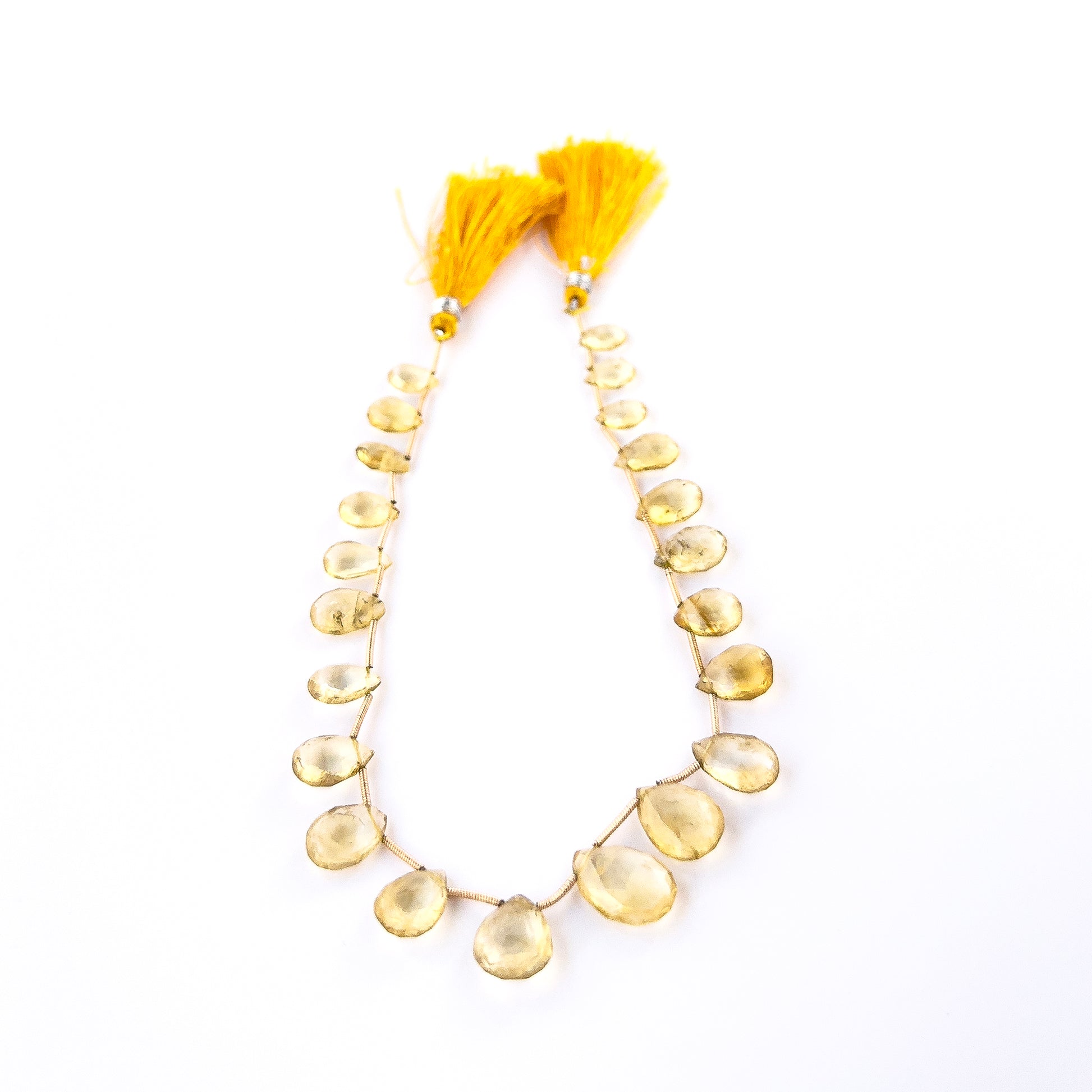 Premium Citrine briolette beads showcasing sparkling facets and rich yellow colour for artisan designs.