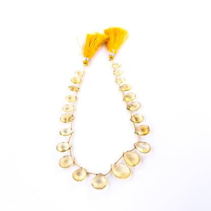 Premium Citrine briolette beads showcasing sparkling facets and rich yellow colour for artisan designs.