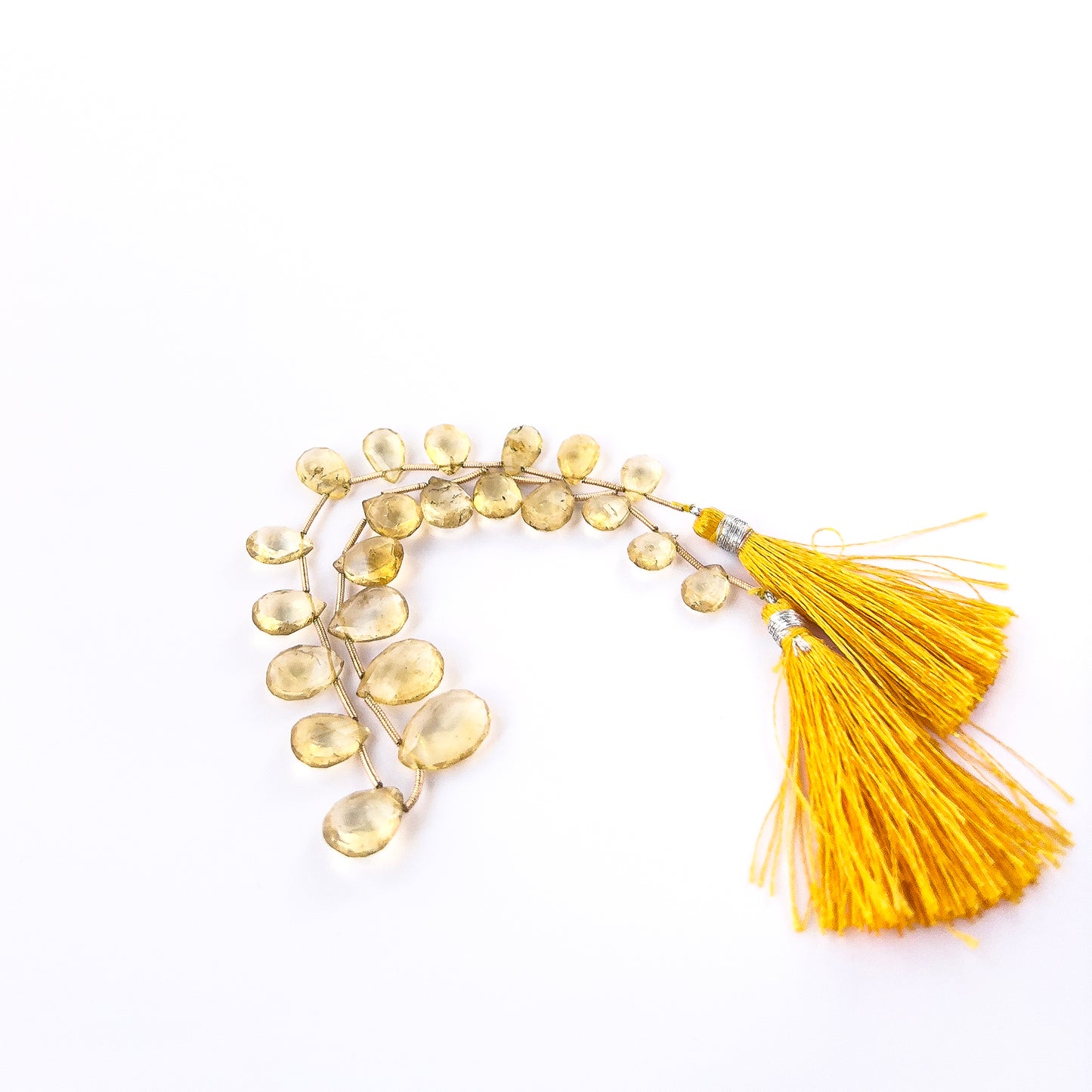 Elegant Citrine briolette beads with shimmering facets, ideal for handmade jewellery components.