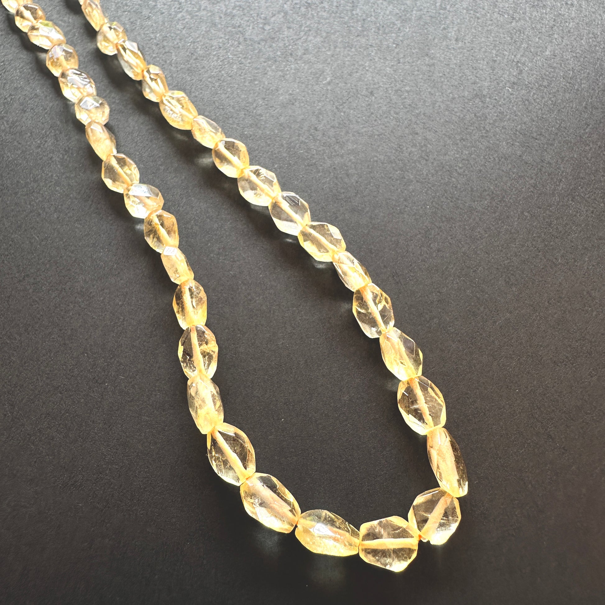 Natural gemstone beads featuring Citrine with precision faceting and warm, sunny colour.