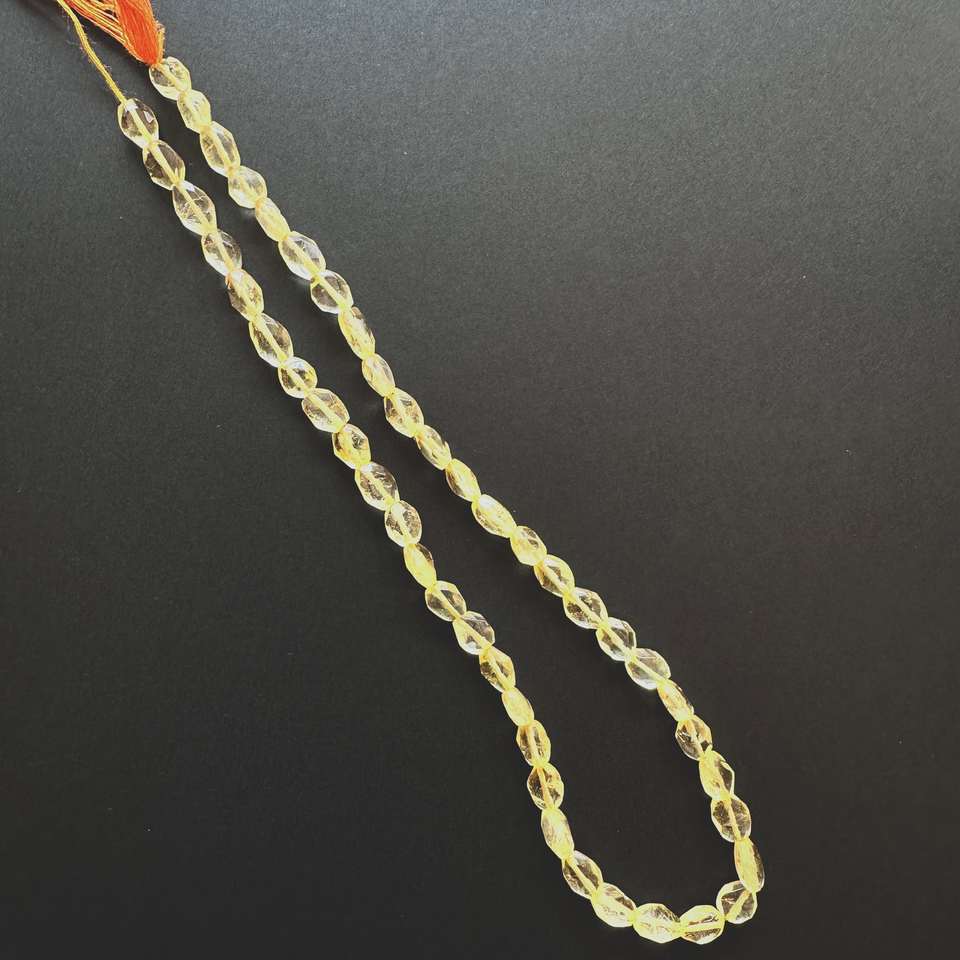 Handmade jewellery components made from Citrine beads with 0.5mm drilled holes.