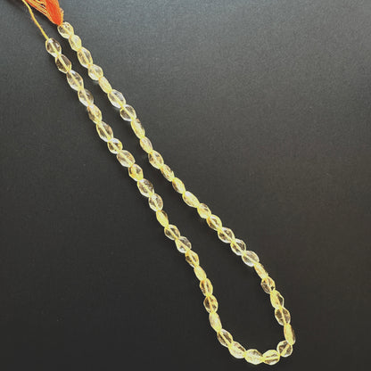 Handmade jewellery components made from Citrine beads with 0.5mm drilled holes.