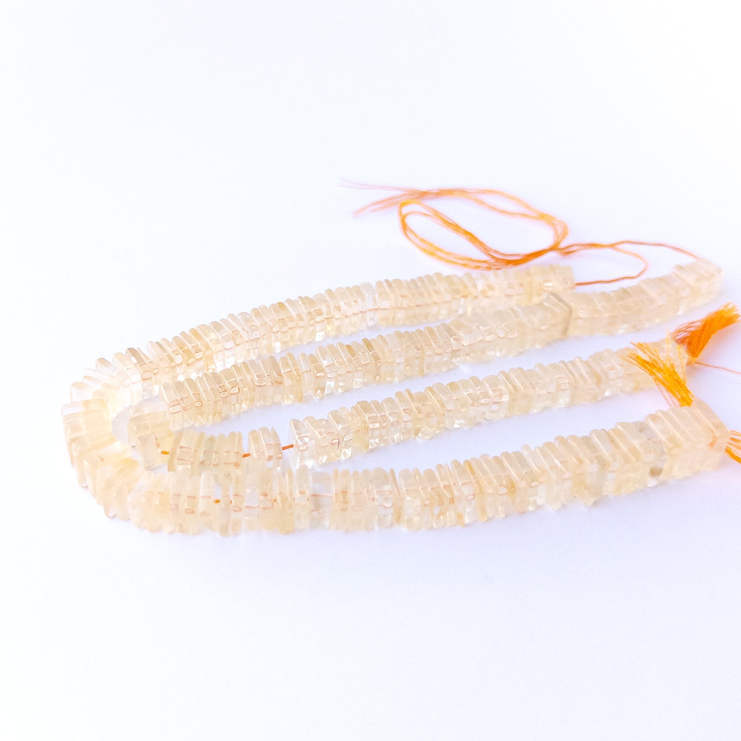Natural Citrine square heishi stone beads showing mixed 6.5–7mm and 6.5–9mm sizes for DIY jewellery designs.