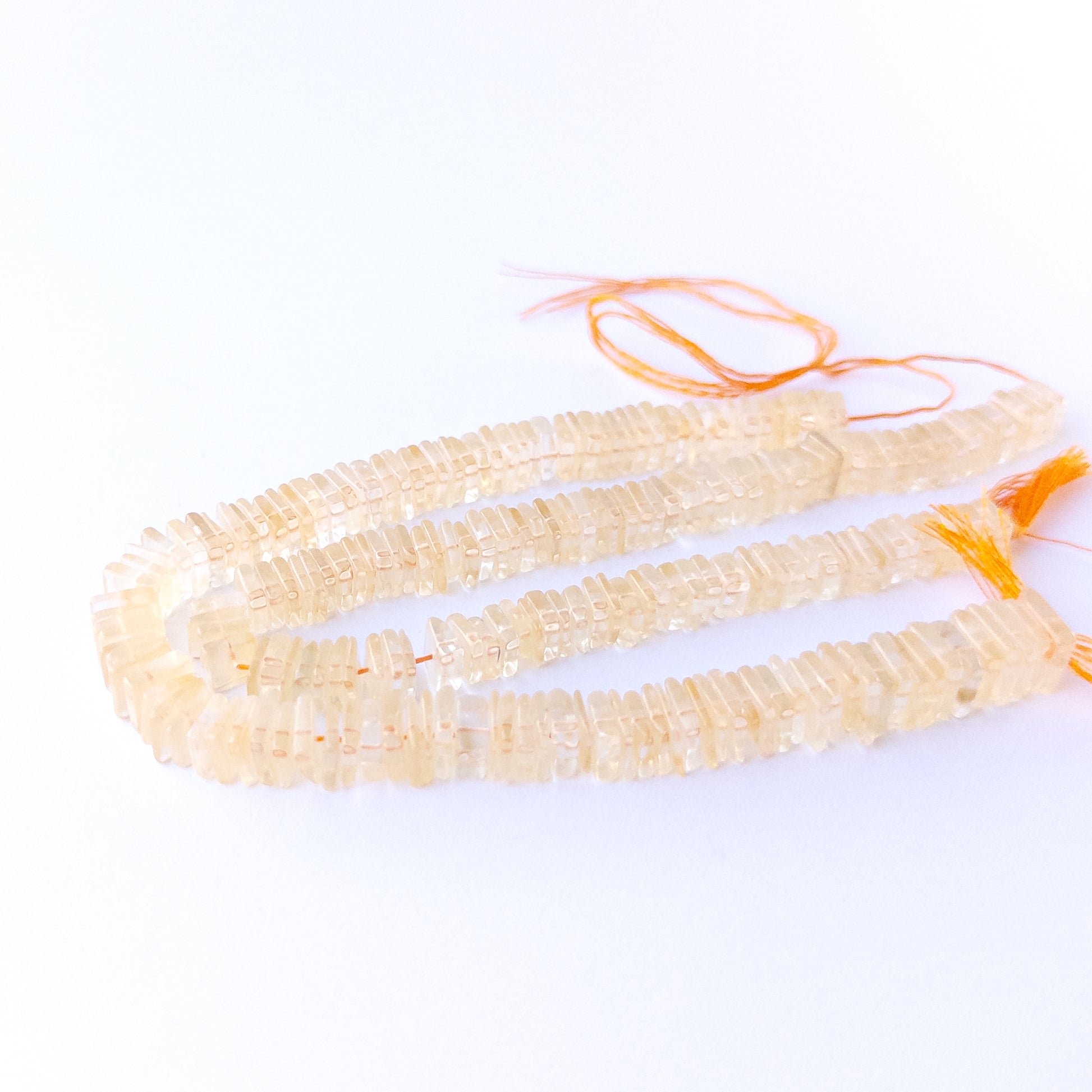 Natural Citrine square heishi stone beads showing mixed 6.5–7mm and 6.5–9mm sizes for DIY jewellery designs.