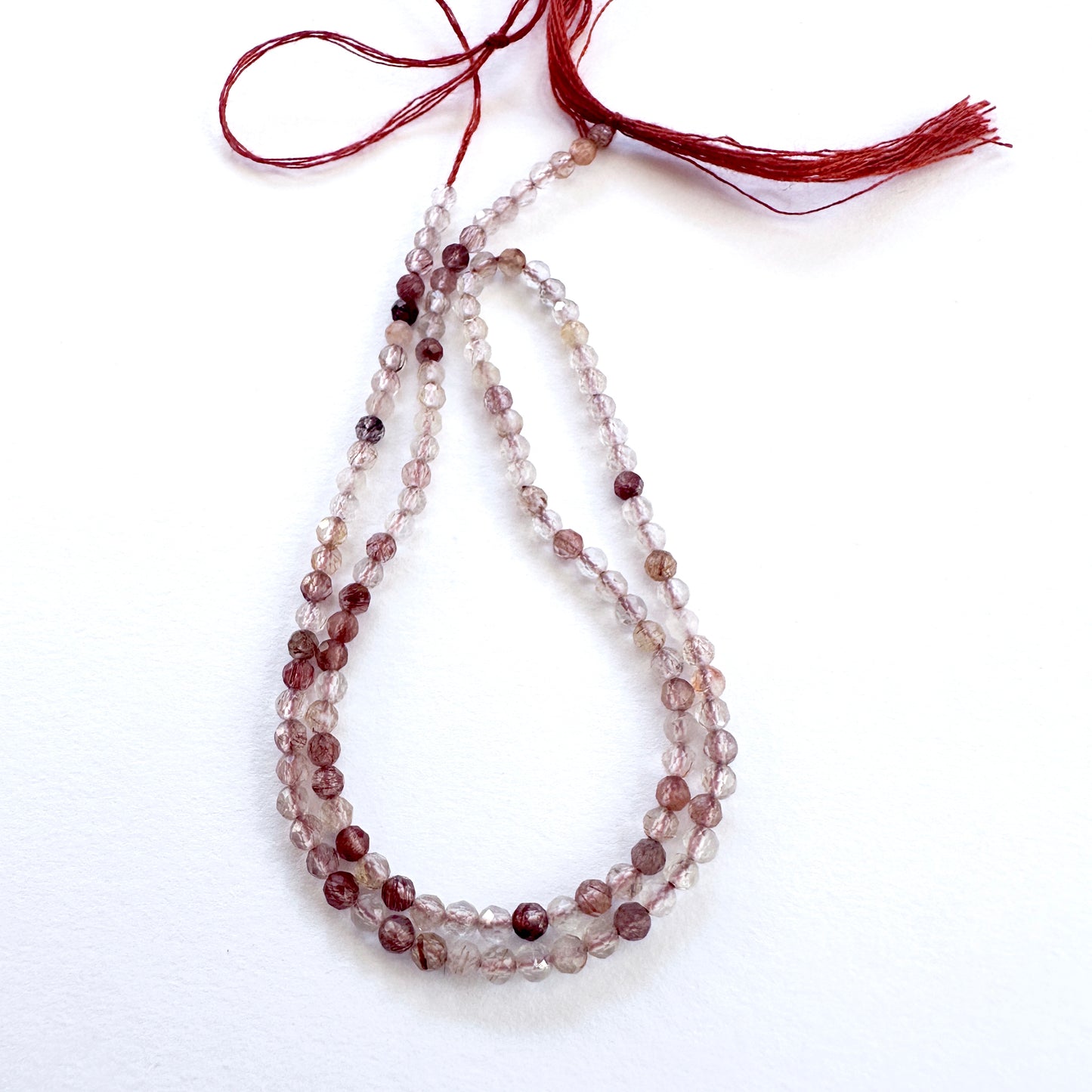 Copper Rutile stone beads with precise micro faceted rondelle cut and lustrous finish.