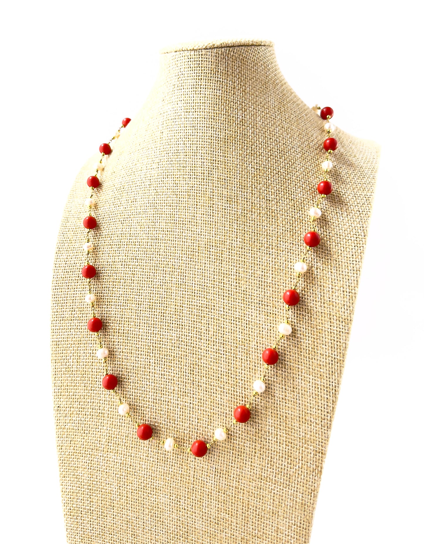 Genuine Coral and Freshwater Pearl smooth round beads showcasing warm coral tones paired with soft pearl lustre for refined jewellery.