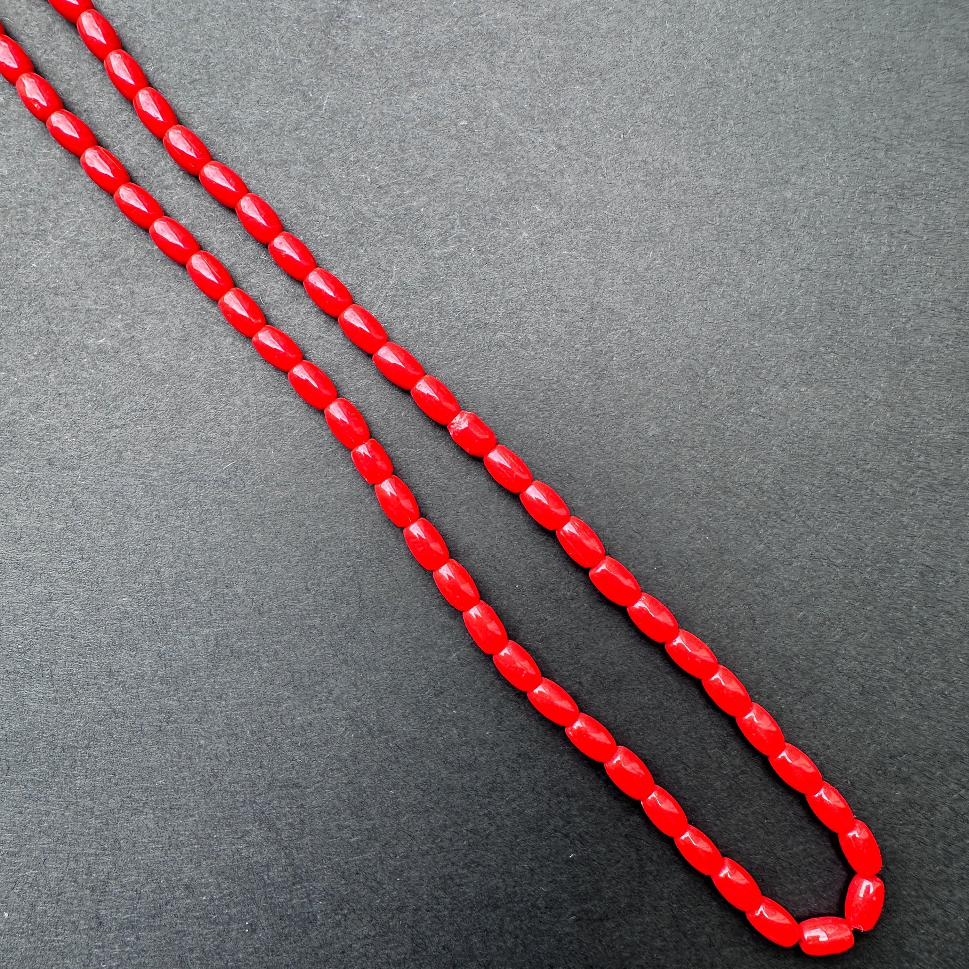 Stone Beads in Coral with polished smooth drum cut for handmade jewellery components.