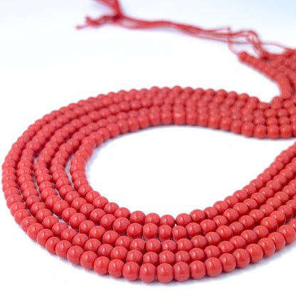 gemstone beads for DIY jewellery featuring polished Taiwan Coral rounds with consistent shape and shine.