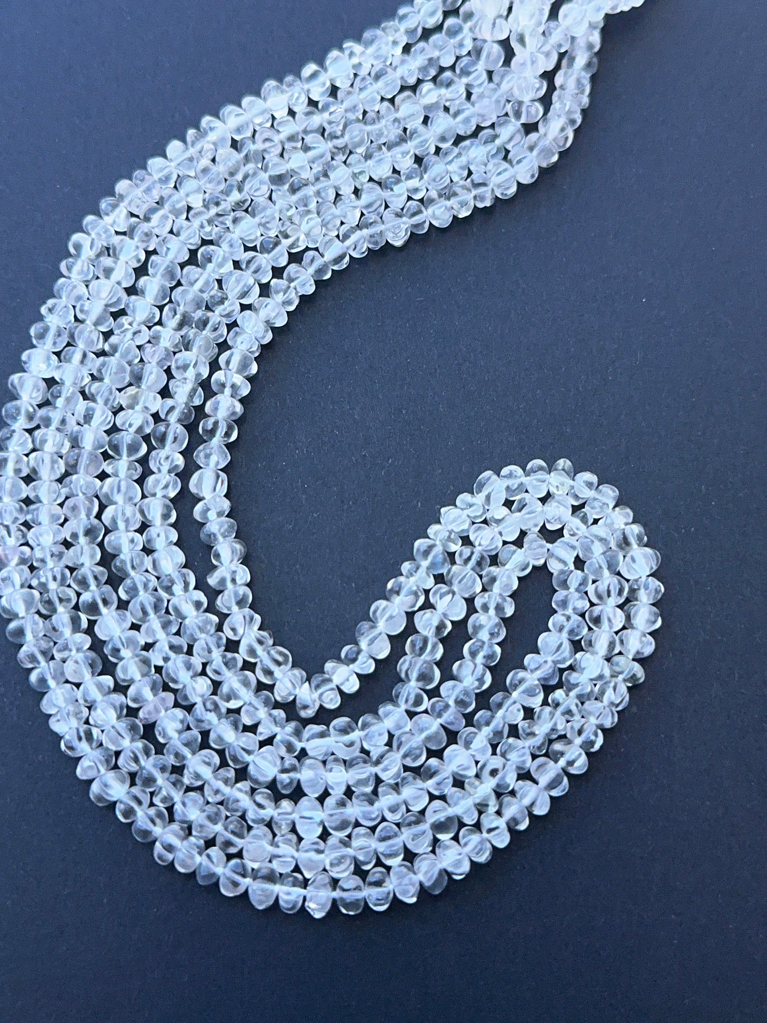 Crystal gemstone pumpkin arranged neatly to showcase clarity and precision faceting.