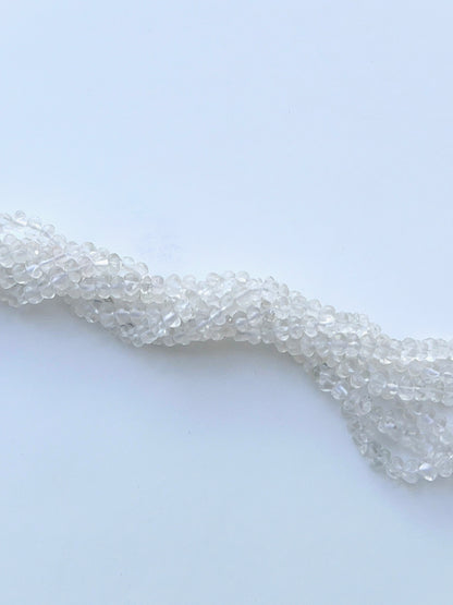 Faceted crystal beads displayed with shimmering surfaces ideal for natural gemstone jewellery making.