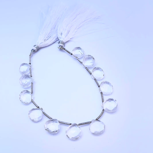 Natural gemstone beads in Crystal heart briolette cut, ideal for DIY jewellery and artisan designs.