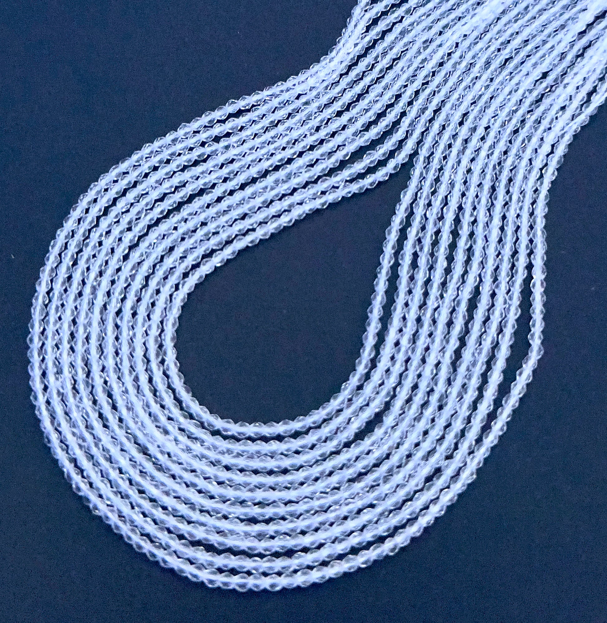 Natural gemstone beads in Crystal rondelle cut, ideal for DIY jewellery and artisan designs.