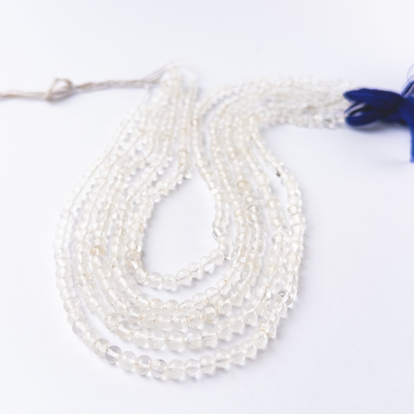 Handmade jewellery components featuring crystal round gemstone beads in 5mm size.