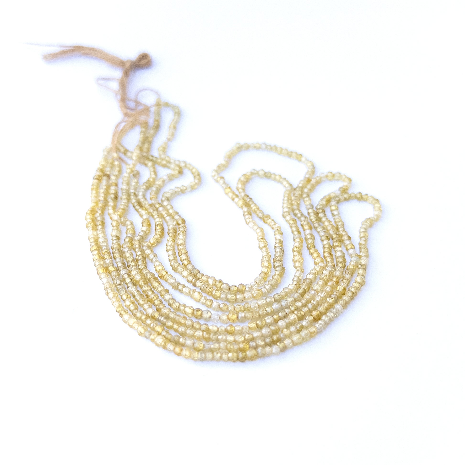 Cubic Zirconia faceted rondelle beads in 2.5–2.7mm sizes, sparkling stones for handmade jewellery.