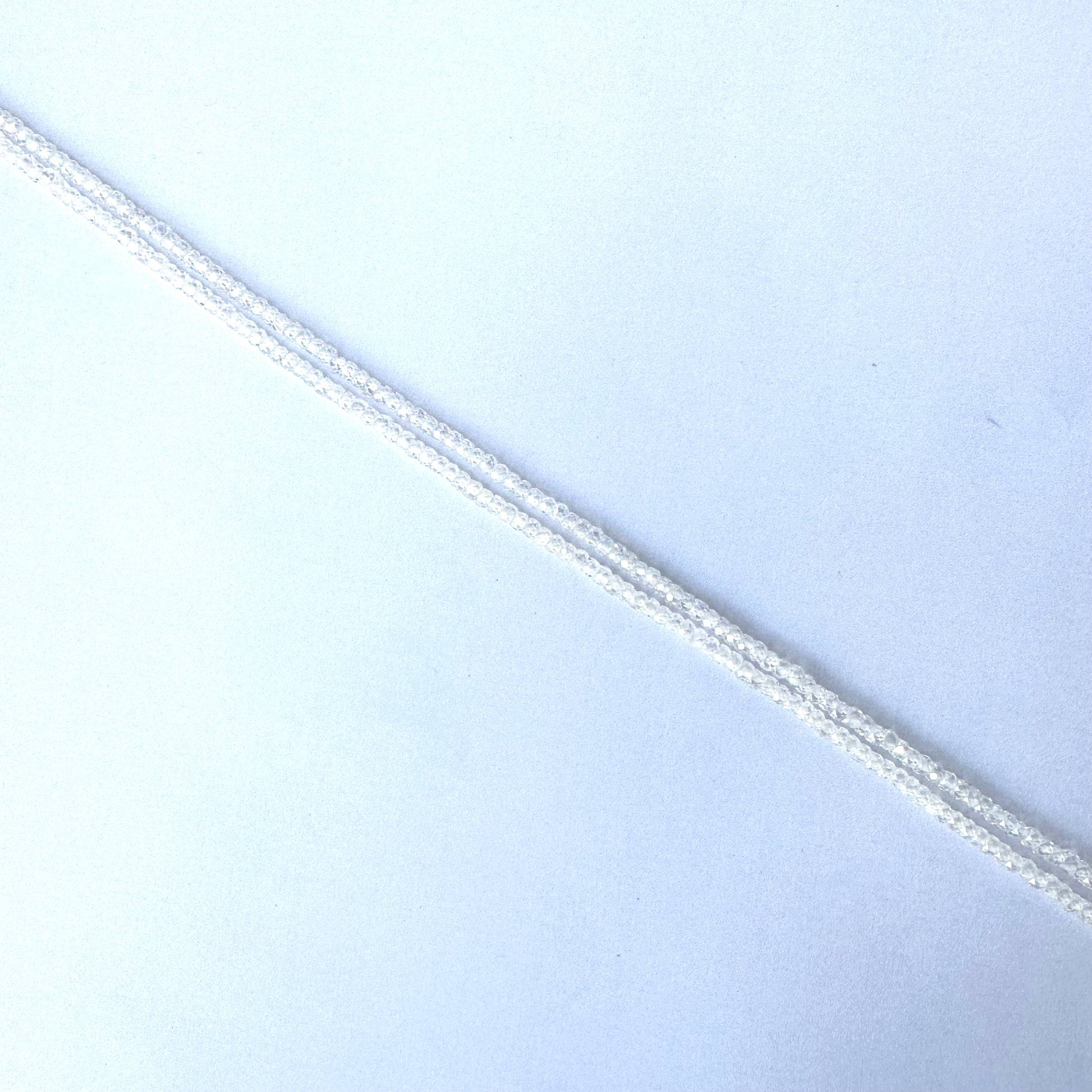 High-quality Cubic Zirconia rondelles with 0.4mm bead holes and radiant finish.