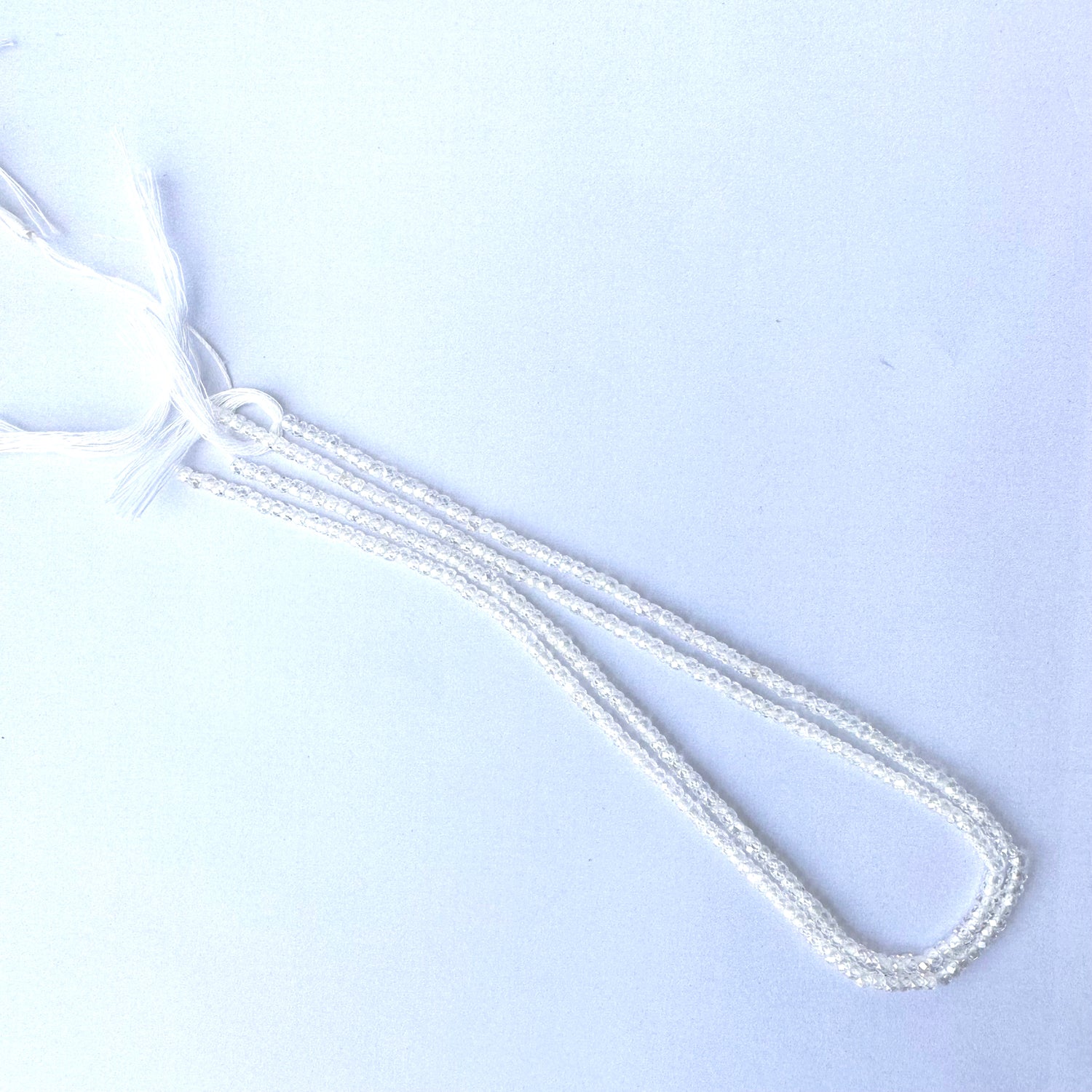 Cubic Zirconia faceted rondelle beads with diamond-like shine and 3.0mm size.