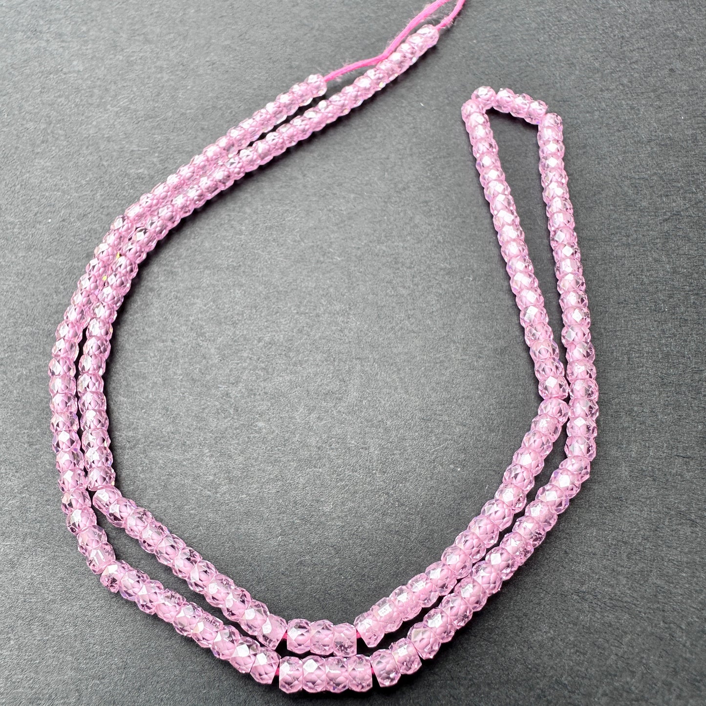 High-sparkle beads in Pink Cubic Zirconia, 3.1mm size, ideal for feminine and elegant DIY jewellery designs.