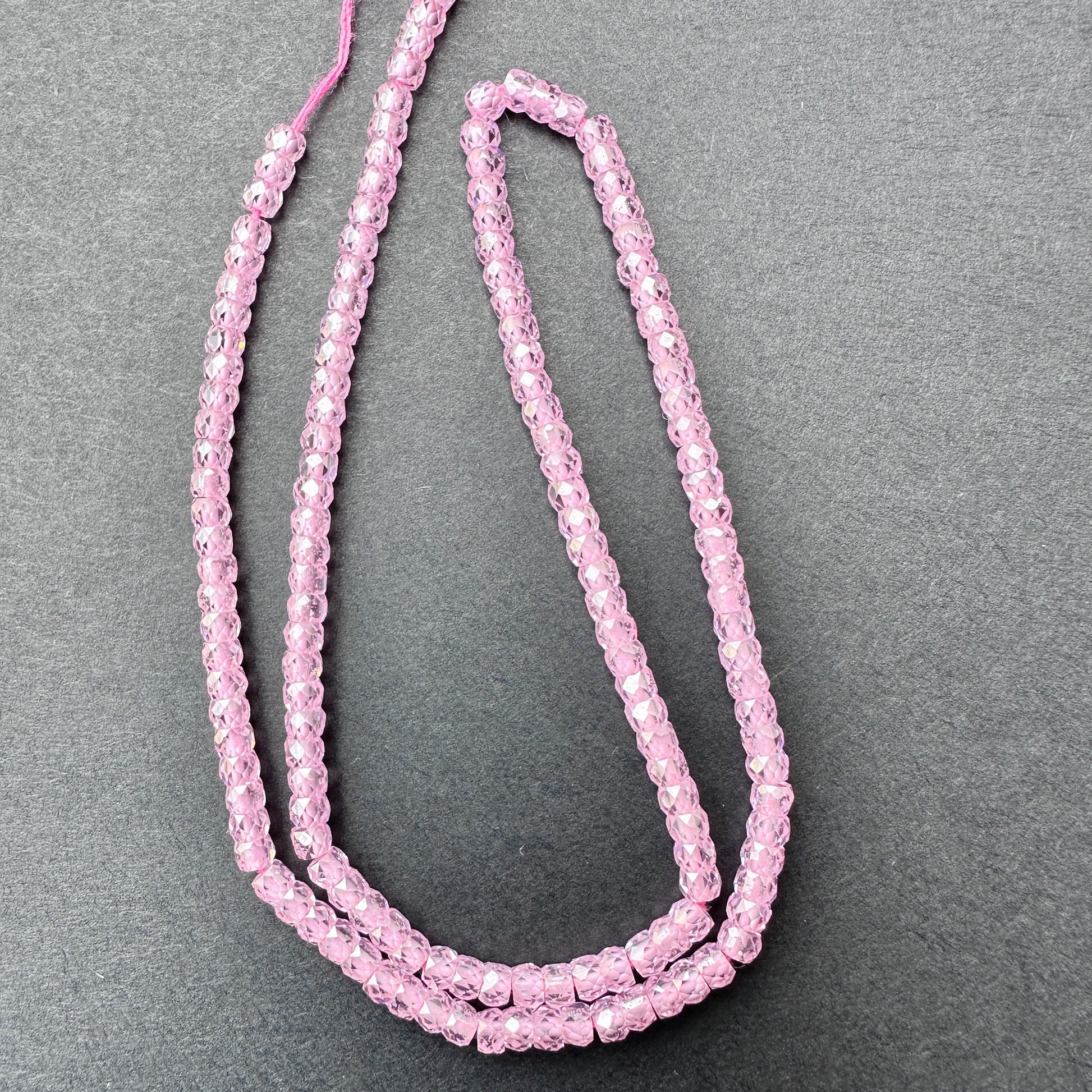 Stone Beads in Pink Cubic Zirconia with refined faceted rondelle cut for handmade jewellery components.