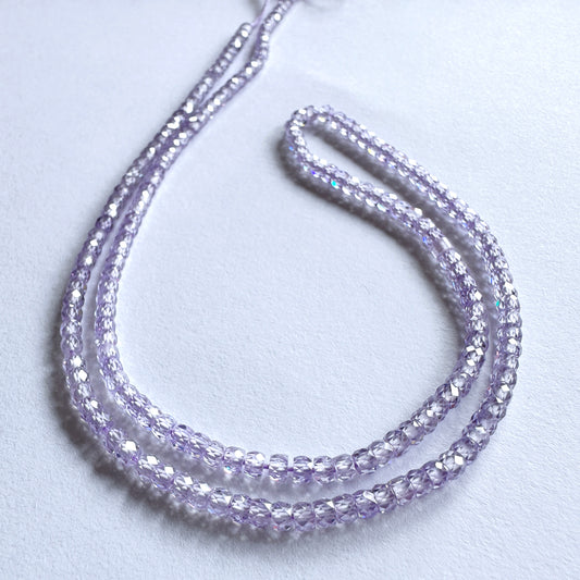 Cubic Zirconia faceted rondelle beads in 3mm size with high clarity and sparkle on a 41cm strand.