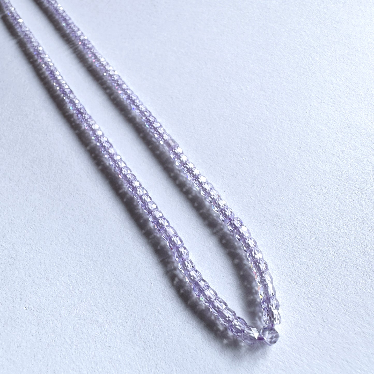 Australian gemstone bead supplier showcasing Cubic Zirconia rondelle beads with 0.4mm drill holes.