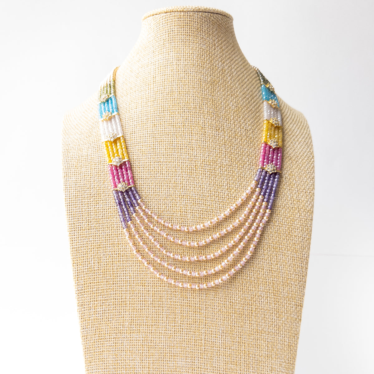 Authentic Cubic Zirconia and Shell Pearl jewellery showcasing sparkling faceted beads in a sophisticated multi-strand design.