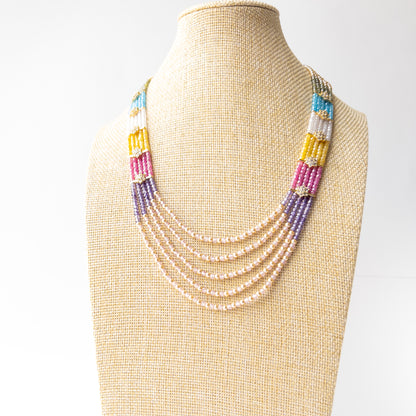 Genuine Cubic Zirconia necklace accented with lustrous Shell Pearls, creating a refined and timeless statement piece.