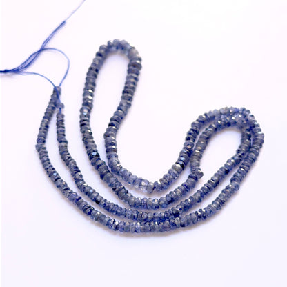 Blue Sapphire 3–4mm faceted rondelle beads on a 43cm strand, perfect for bespoke designs and special‑occasion pieces.
