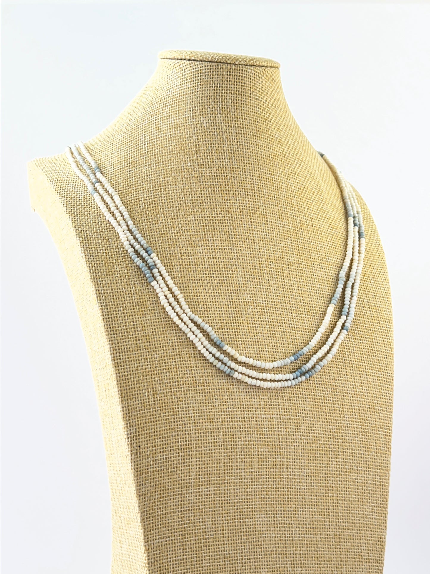 Layered denim opal necklace crafted with sparkling faceted rondelle beads at 54–56cm.