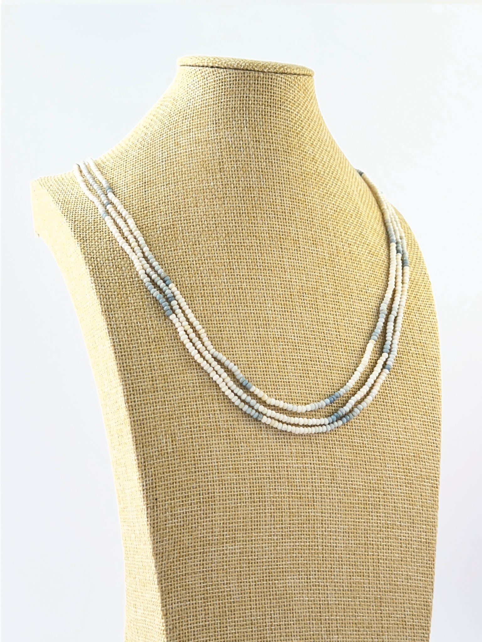 Layered denim opal necklace crafted with sparkling faceted rondelle beads at 54–56cm.