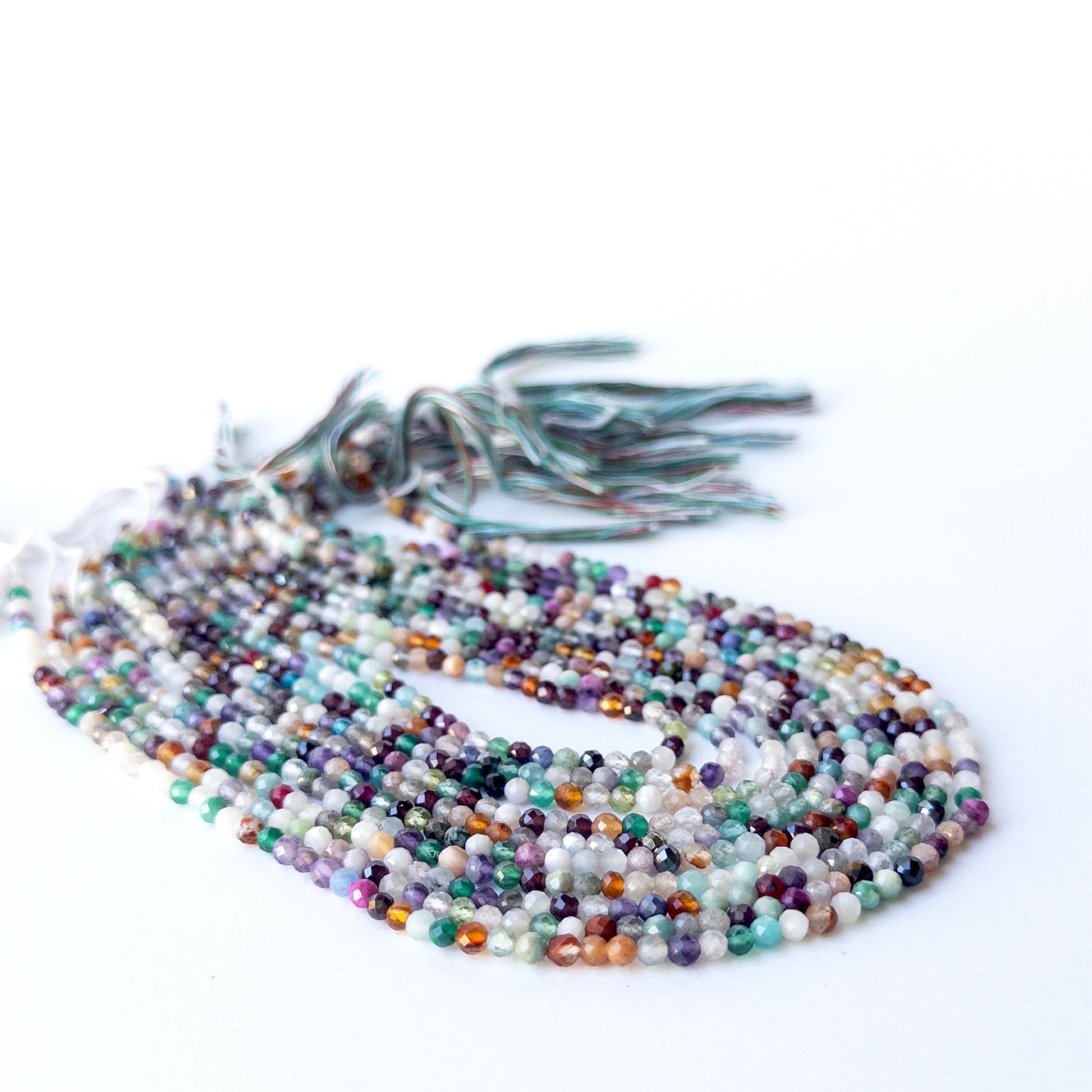 Authentic Disco gemstone beads showing reflective shine and texture for artisan gemstone beadwork.