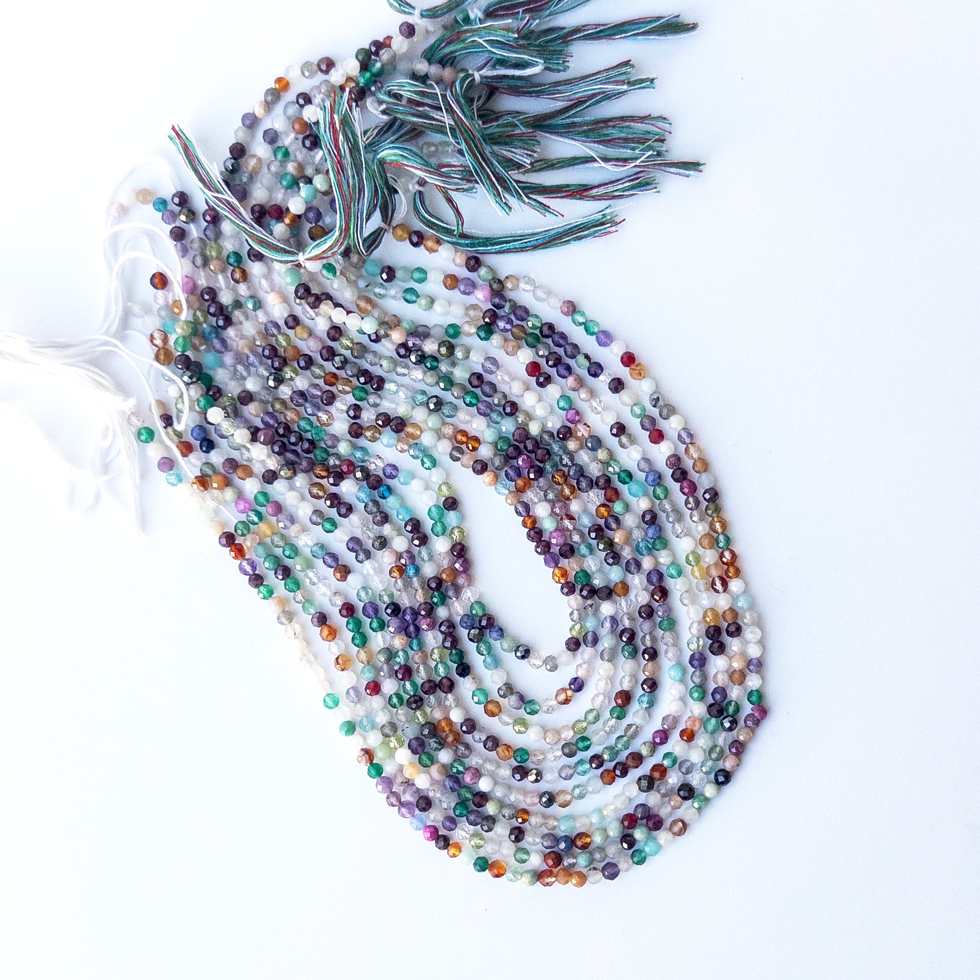 Delicate Disco faceted rondelles showcasing shimmer and clarity for DIY gemstone jewellery designs.