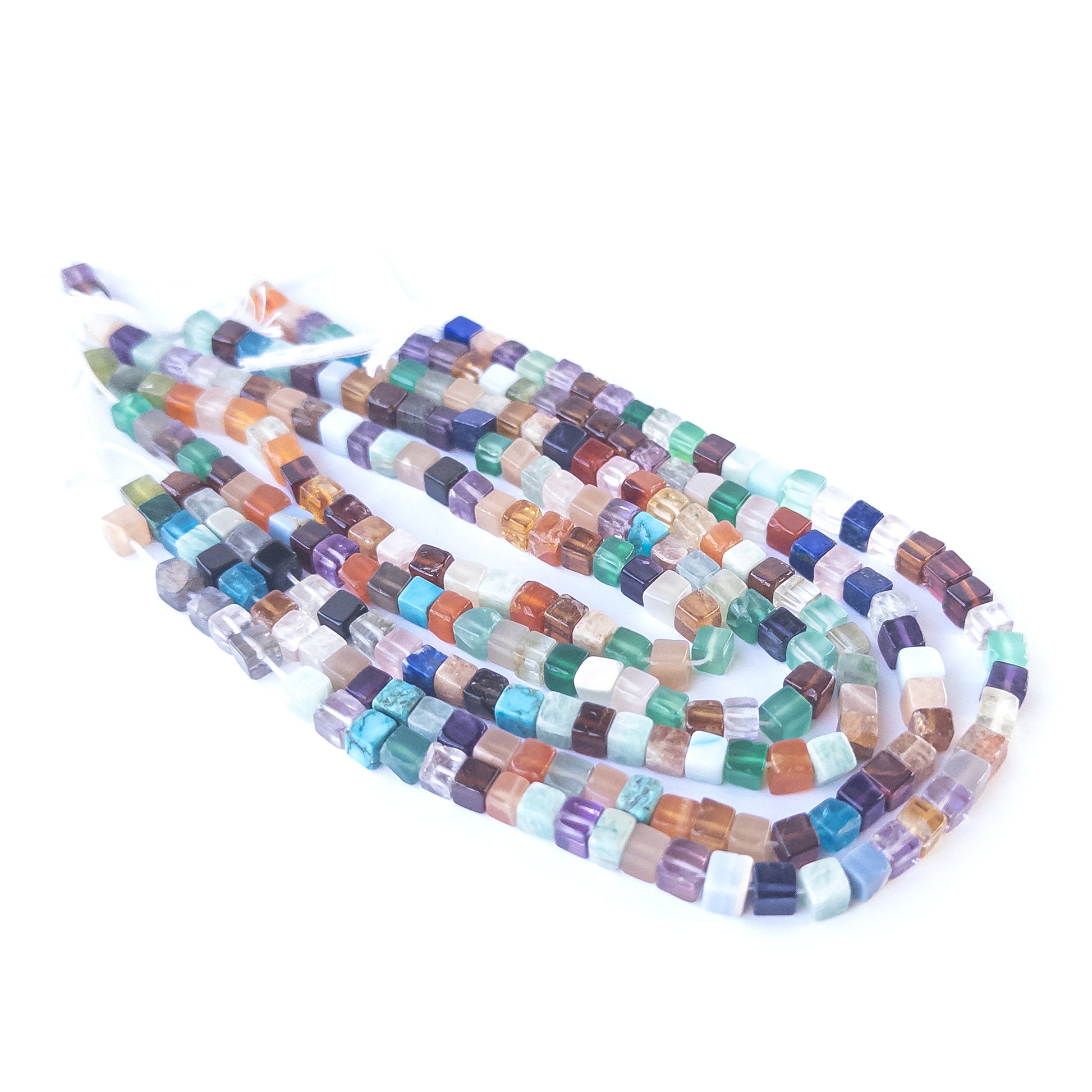 High‑quality Disco smooth cube beads in 4.3–4.5mm size offering clarity and lustre for artisan jewellery projects.