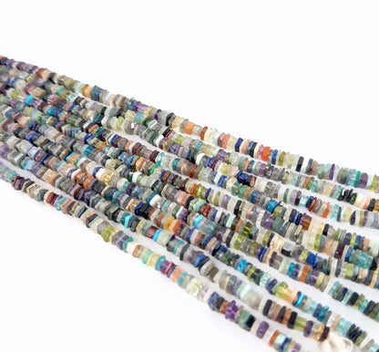 Disco smooth heishi beads sized 4–4.5mm arranged in a 20cm strand, showing glossy surfaces and a clean rounded profile.