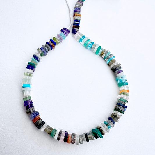 Disco smooth heishi beads with flat-disc shape arranged on a 20cm strand for jewellery making.