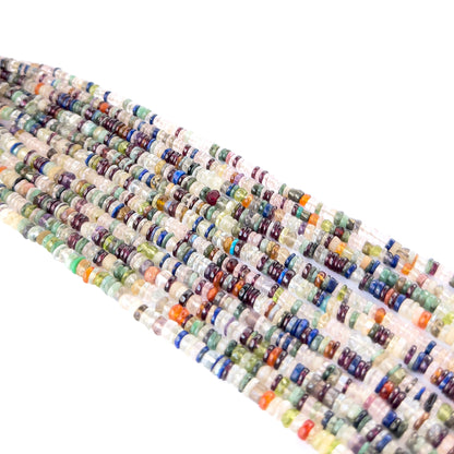 Premium smooth wheel heishi beads showcasing polished surfaces and uniform shape for artisan designs.