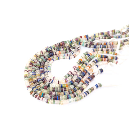 Close‑up of Disco wheel heishi beads with glossy finish, perfect for authentic gemstone bead jewellery.